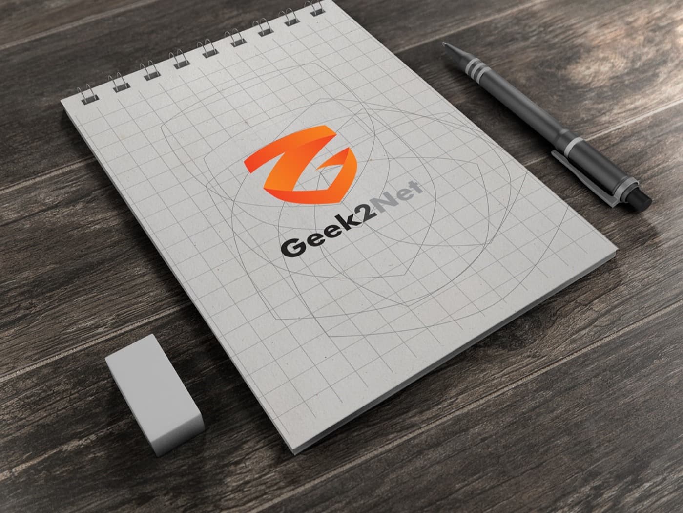 Libreta con la construcción del símbolo de Geek2Net